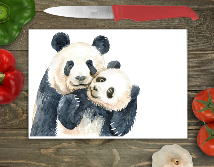 Bwrdd Torri Gwydr Panda a'i Gena ar wyneb gwaith cegin